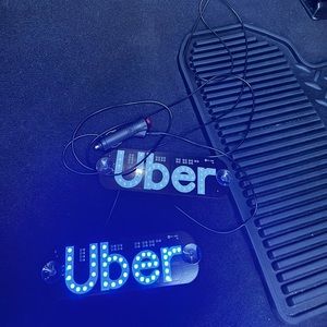 2 lighted Uber windshield placards